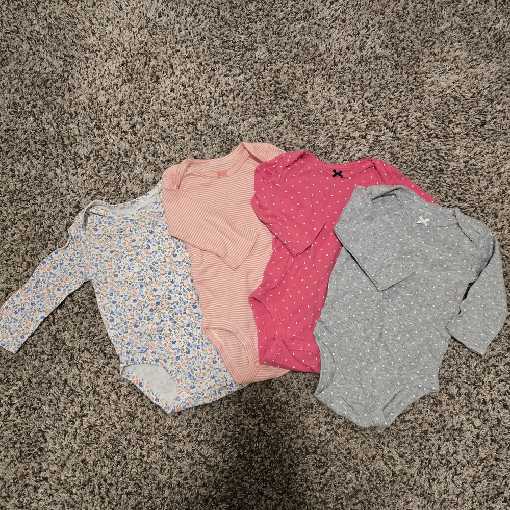 Set of Four Baby bodysuits